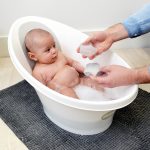 Newborn baby in Bath with Wishy Low Res